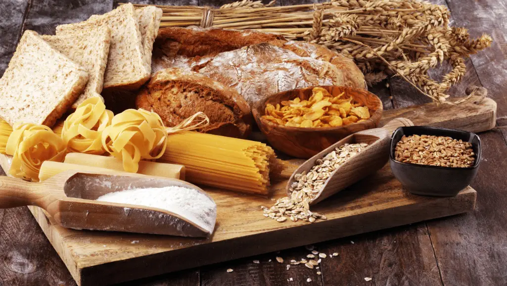 a collection of grains in the form of pastas, breads, and in the original form