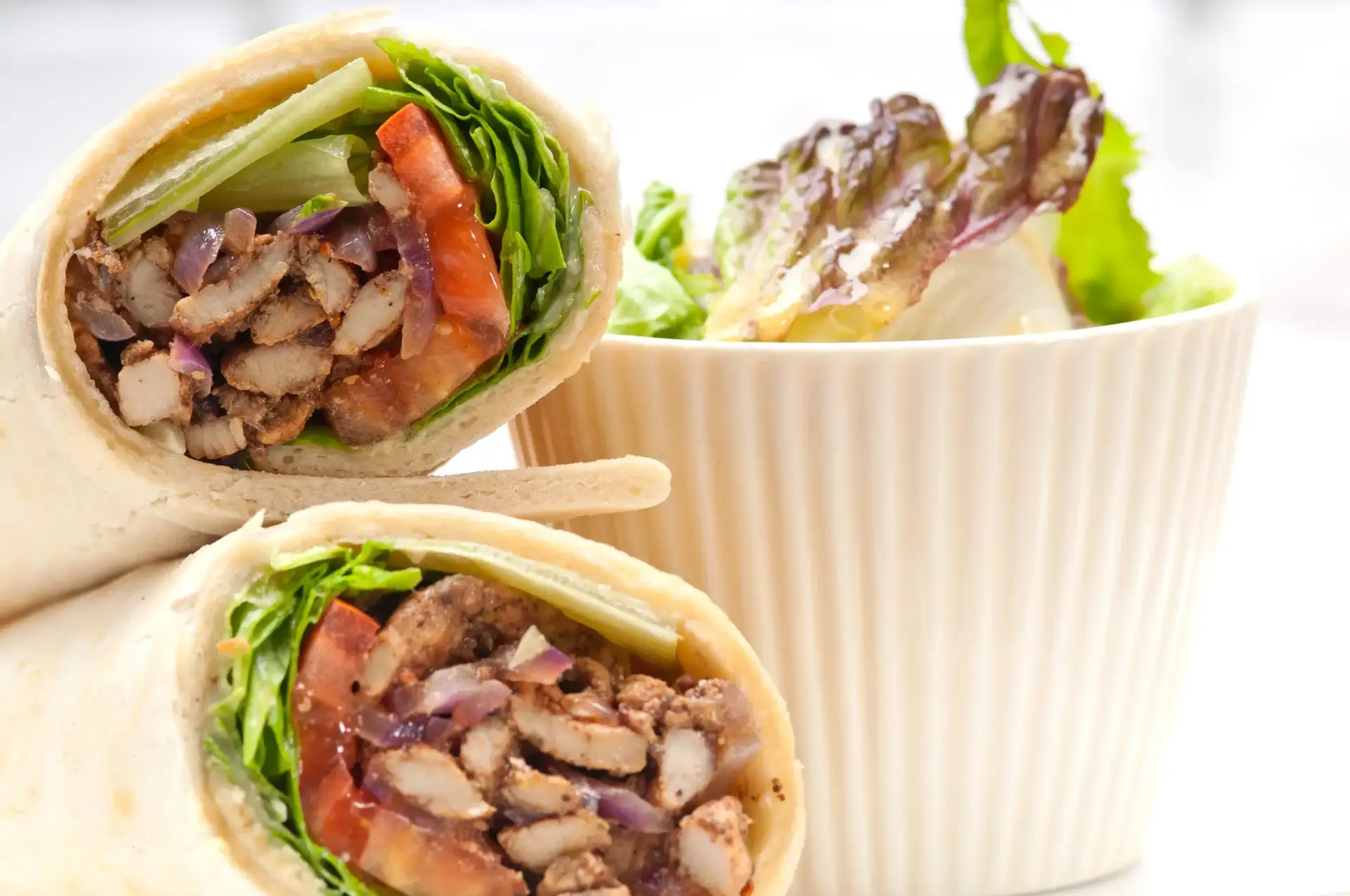 Juicy chicken shawarma wrapped in Aladdin's freshly baked pita bread