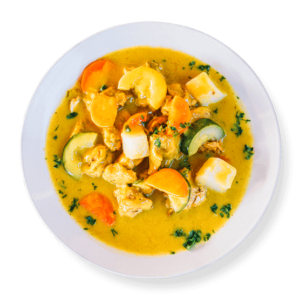 Curry chicken plate from Aladdin Mediterranean Cuisine—chicken breast in creamy turmeric-ginger curry with potatoes, carrots, and cranberry-almond rice