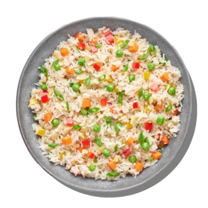 Vegetable rice colorful rice blended with carrots, peas, bell peppers, and Mediterranean herbs at Aladdin Houston