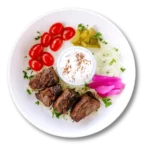 Grilled sirloin beef kebab with fresh vegetables – Aladdin Mediterranean Cuisine Houston