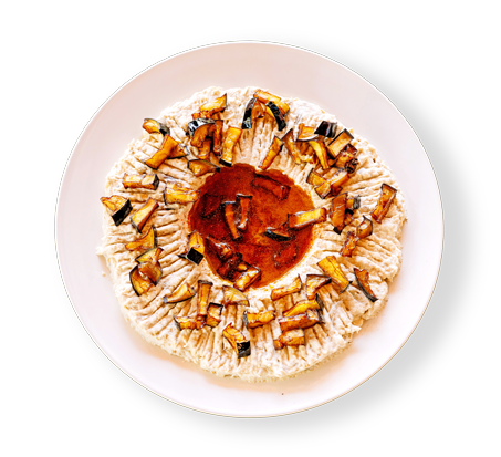 Smoky baba ghanoush dip topped with roasted eggplant and olive oil – Aladdin Mediterranean Cuisine Houston.