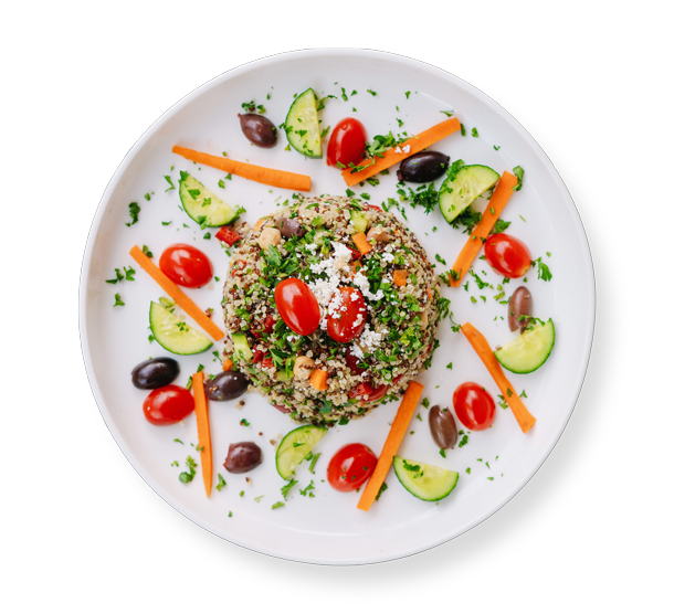 Colorful quinoa salad with chickpeas, cucumbers, and tomatoes at Aladdin Mediterranean Cuisine in Houston, Texas