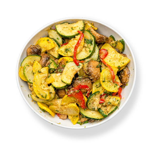 Colorful lemon cilantro squash with zucchini, bell peppers, and herbs served at Aladdin Mediterranean Cuisine in Houston.