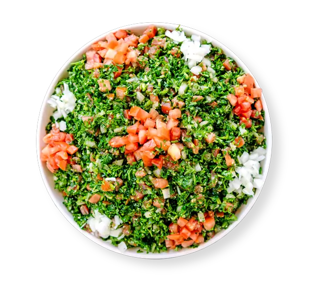 Fresh Tabbouleh Salad with parsley, tomatoes, and bulgur from Aladdin Mediterranean Cuisine Houston.
